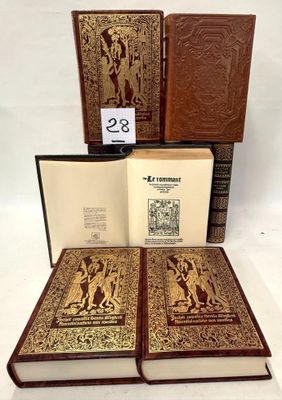 three books are stacked on top of each other on a white surface
