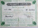 a picture of a green and white certificate with a picture of a man on it