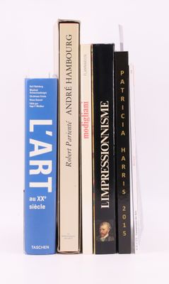 three books that are sitting on top of each other
