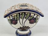 an image of a decorative bowl with a lid