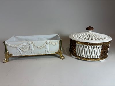 pair of white and gold porcelain covered dishes with handles
