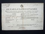 an old document with writing on it on a black background