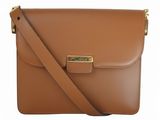 a brown leather cross body bag with gold hardware