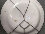 an image of a white plate with a chain around it