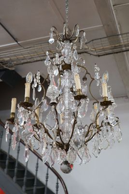 a chandelier hanging from the ceiling in a room