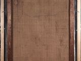 an old picture frame with a piece of wood in the middle of it