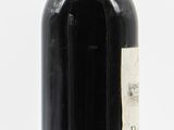 a bottle of wine that is sitting on a table