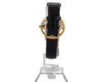 an image of a watch on a stand on a white background