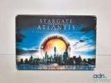 the box for stargate atlantis is sitting on a table