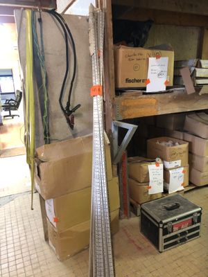 a room with a lot of boxes and boxes on the shelves