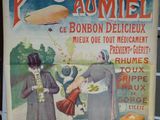 affiche publicitaire pour les pastilles Anniels en français, représentant un homme et une femme