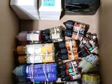 a cardboard box filled with assorted items in it