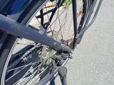 a close up view of a bicycle with a rear wheel