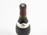 a bottle of wine that is sitting on a table
