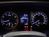 a close up of a car dashboard with a speedometer and gauges