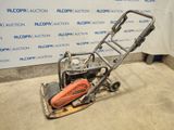 an image of a small machine that is sitting on the floor