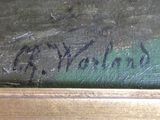 an image of a close up of a painting on a wooden table