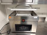 une photo d'un réchauffeur de plats professionnel dans une cuisine professionnelle