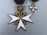 a medal with a star on it and a ribbon around it