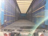 the back end of a truck with a flat bed in the back of it