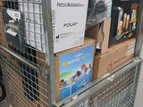 a metal cart with several boxes on top of it