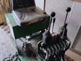 an image of a tractor with a seat on it ' s back