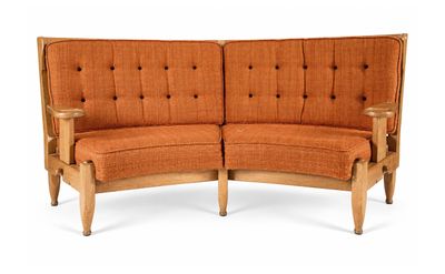 orange upholstered loveseat with wood frame and tufted upholstered cushions