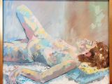 a painting of a nude woman laying on a bed