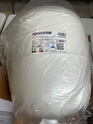 a large white object wrapped in plastic sitting on top of a table