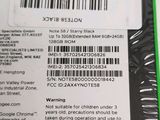 the back of a cell phone with a barcode on it