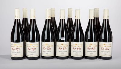 six bottles of red wine lined up in a row