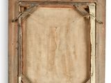 an old wooden picture frame with a rope hanging on the wall