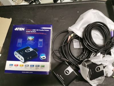 an image of a video game system and accessories on a table