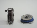 two reels that are next to each other on a table
