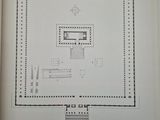 an open book with a drawing of a plan of a building