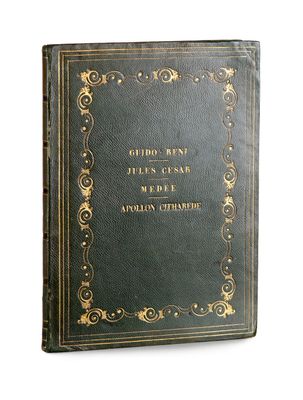 un livre noir orné d'inscriptions dorées, posé sur une surface blanche