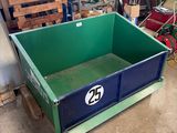 a green box with a number on it in a garage