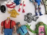 a lot of action figures that are on the table