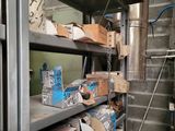 many boxes and boxes on the shelves in the room
