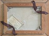 a picture of a picture frame with a ribbon around it