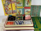 a lot of games in a box on the table