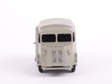a small toy car that is sitting on a white surface
