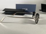 a close up of a pair of sunglasses on a table