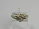 a yellow gold ring with a diamond set in the center