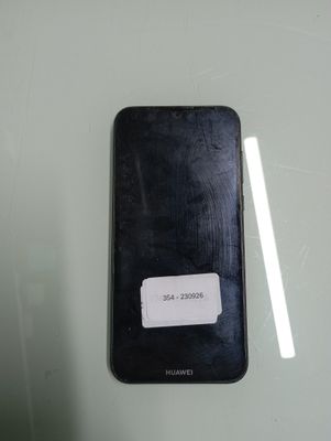 a cell phone with a sticker on the back of it