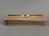 chanel, a beige leather and canvas case with a button closure