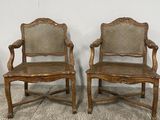 pair of antique oak chairs with cane back and cane arms