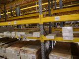 many boxes on the shelves in the warehouse