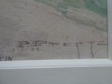 une photo d'une photo représentant une plage, sur laquelle figurent des inscriptions