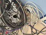 a pile of wires and wires on the floor